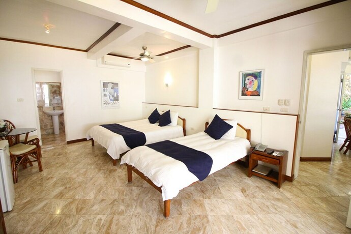 Imagen de la habitación del Hotel Mermaid Resort Puerto Galera. Foto 17