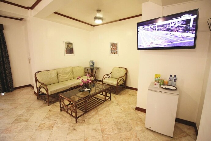 Imagen de la habitación del Hotel Mermaid Resort Puerto Galera. Foto 21