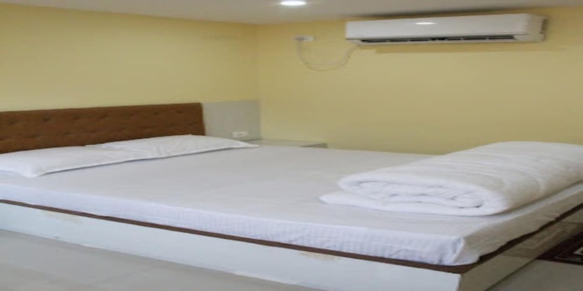 Imagen de la habitación del Hotel MeroStay 021 Ganga Sagar. Foto 4