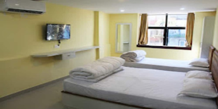Imagen de la habitación del Hotel MeroStay 021 Ganga Sagar. Foto 6