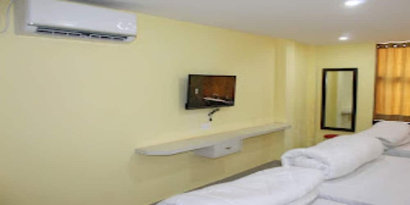 Imagen de la habitación del Hotel MeroStay 021 Ganga Sagar. Foto 8