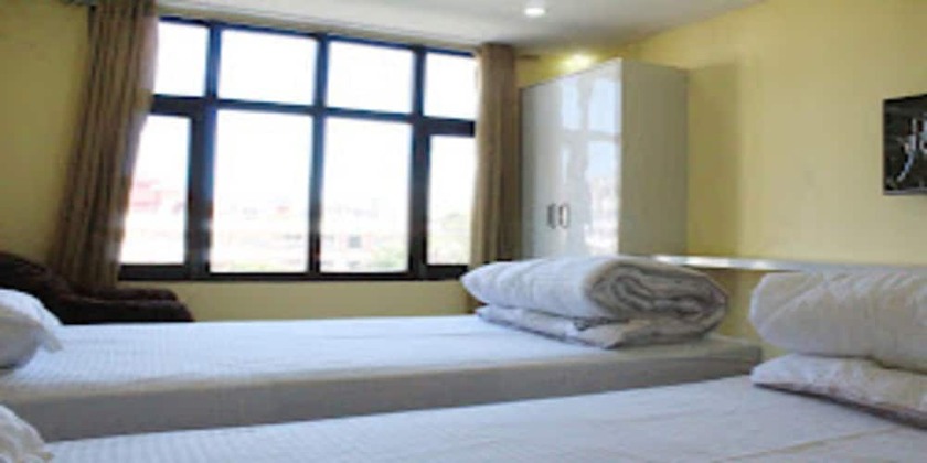 Imagen de la habitación del Hotel MeroStay 021 Ganga Sagar. Foto 10
