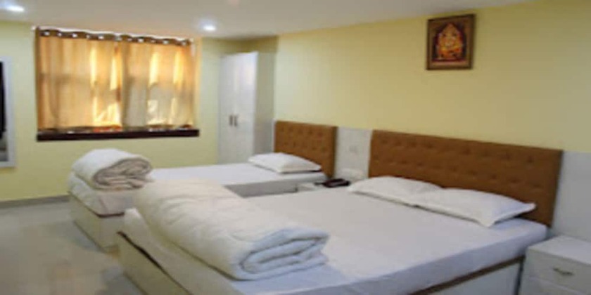 Imagen de la habitación del Hotel MeroStay 021 Ganga Sagar. Foto 11