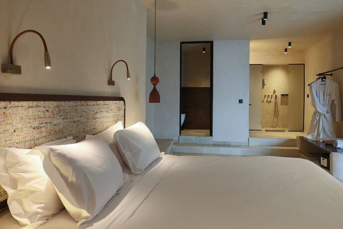 Imagen de la habitación del Hotel Meroviglia Boutique. Foto 13