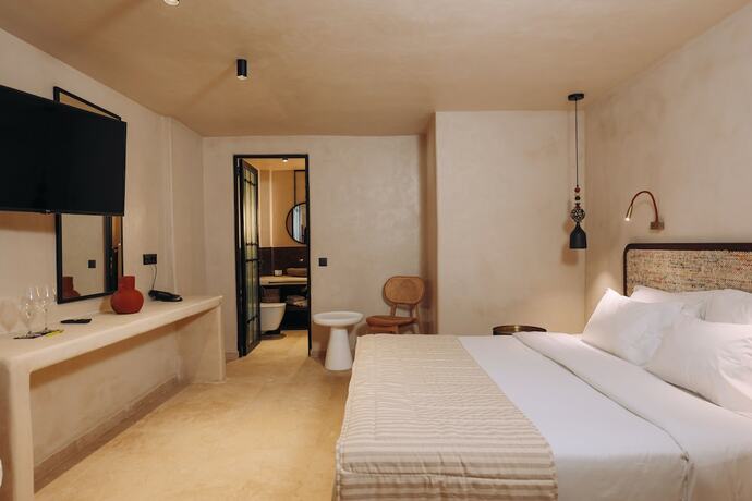 Imagen de la habitación del Hotel Meroviglia Boutique. Foto 19