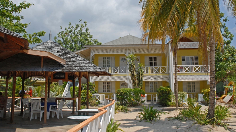 Imagen del bar/restaurante del Hotel Merrils Beach Resort Ii. Foto 5