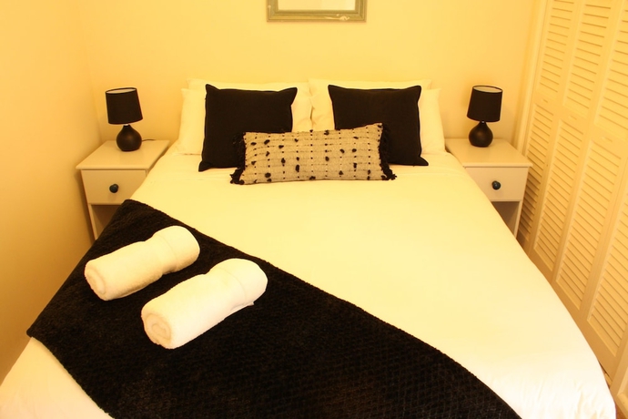 Imagen de la habitación del Hotel Merrimeet Cottages. Foto 10