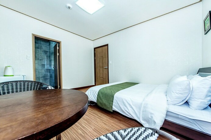 Imagen de la habitación del Hotel Merry J. Foto 19