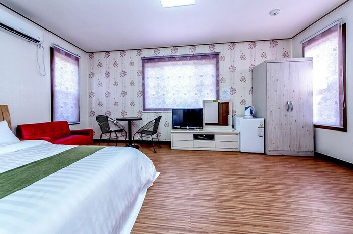 Imagen de la habitación del Hotel Merry J. Foto 37