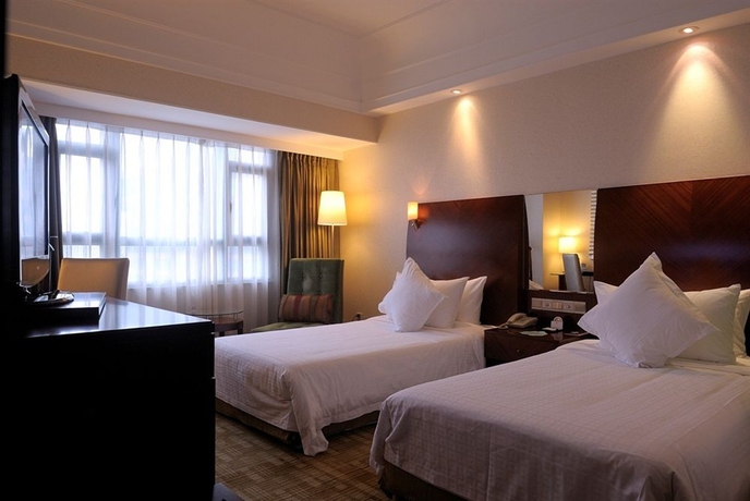 Imagen de la habitación del Hotel Merry Shanghai. Foto 5