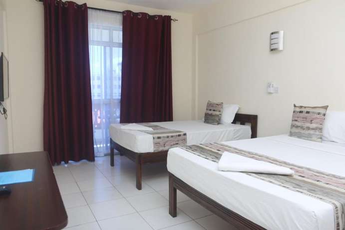 Imagen de la habitación del Hotel Merry Villa and Apartments. Foto 10