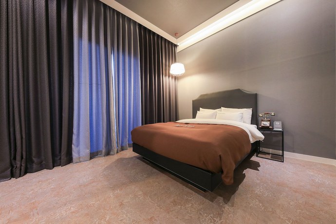 Imagen de la habitación del Hotel Merrymud. Foto 2