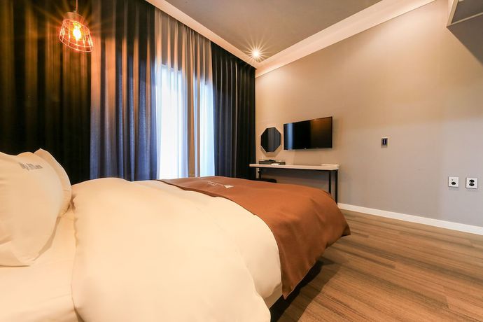 Imagen de la habitación del Hotel Merrymud. Foto 5