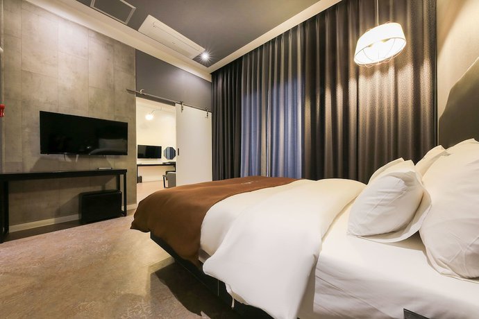 Imagen de la habitación del Hotel Merrymud. Foto 9