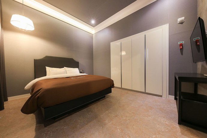 Imagen de la habitación del Hotel Merrymud. Foto 13