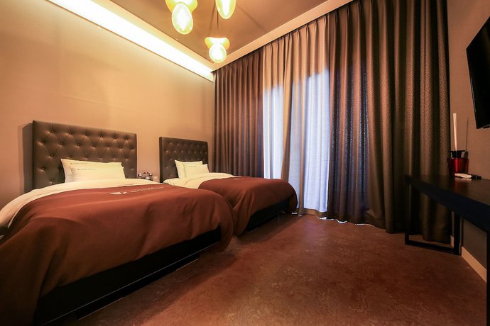 Imagen de la habitación del Hotel Merrymud. Foto 15