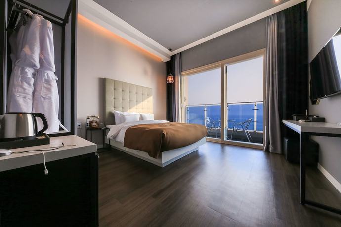 Imagen de la habitación del Hotel Merrymud. Foto 16