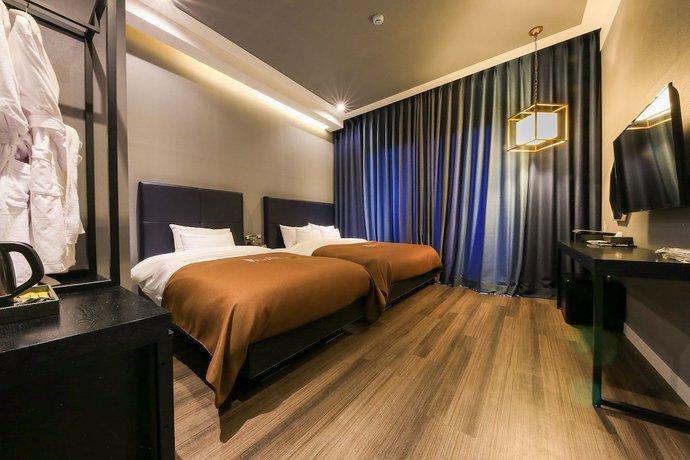 Imagen de la habitación del Hotel Merrymud. Foto 18