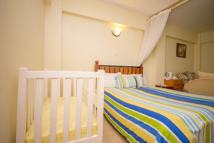 Imagen de la habitación del Hotel Meru Paramount. Foto 4