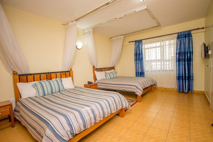 Imagen de la habitación del Hotel Meru Paramount. Foto 5