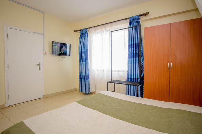 Imagen de la habitación del Hotel Meru Paramount. Foto 6