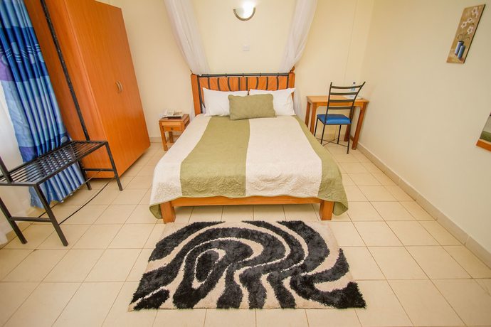 Imagen de la habitación del Hotel Meru Paramount. Foto 7