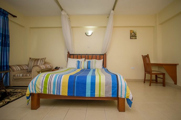 Imagen de la habitación del Hotel Meru Paramount. Foto 8