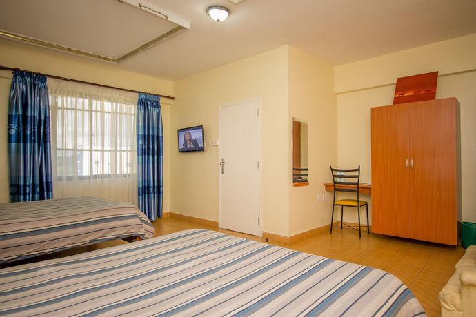 Imagen de la habitación del Hotel Meru Paramount. Foto 9