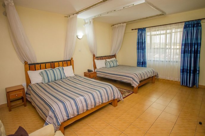 Imagen de la habitación del Hotel Meru Paramount. Foto 11
