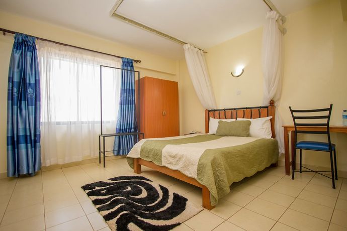 Imagen de la habitación del Hotel Meru Paramount. Foto 12