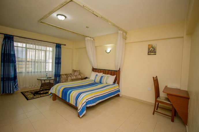 Imagen de la habitación del Hotel Meru Paramount. Foto 13