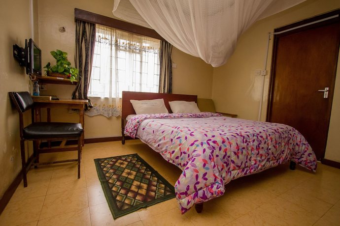 Imagen de la habitación del Hotel Meru Safari. Foto 8
