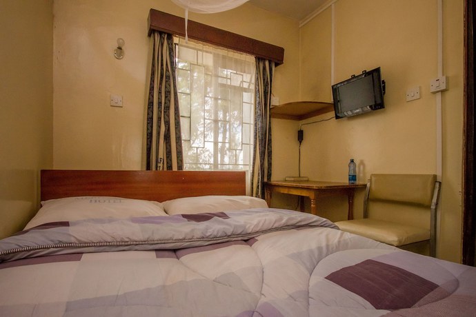 Imagen de la habitación del Hotel Meru Safari. Foto 14