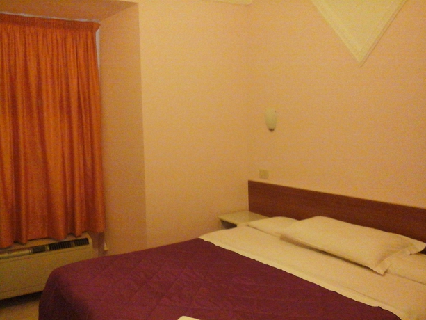 Imagen de la habitación del Hotel Merulana Star. Foto 10