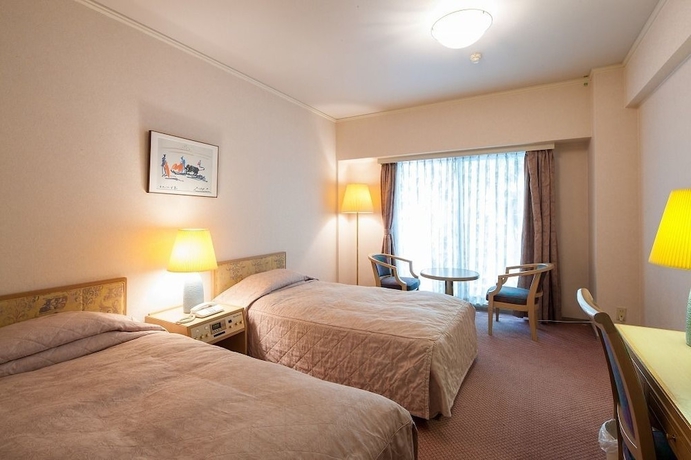 Imagen de la habitación del Hotel Merveille Arima. Foto 11
