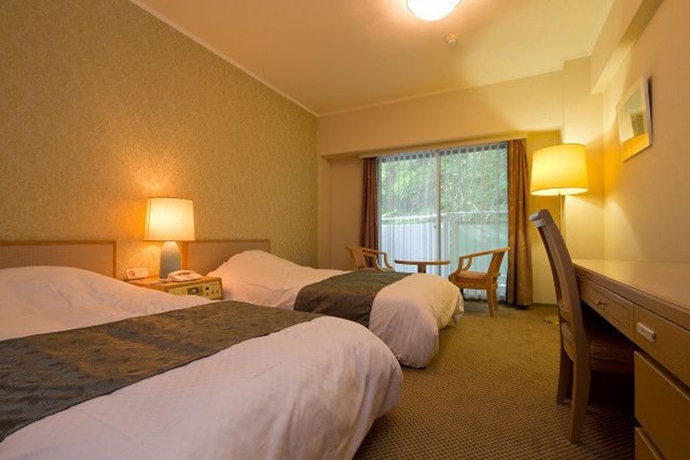 Imagen de la habitación del Hotel Merveille Arima. Foto 12