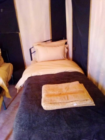 Imagen de la habitación del Hotel Merzouga Camp Nomad. Foto 11