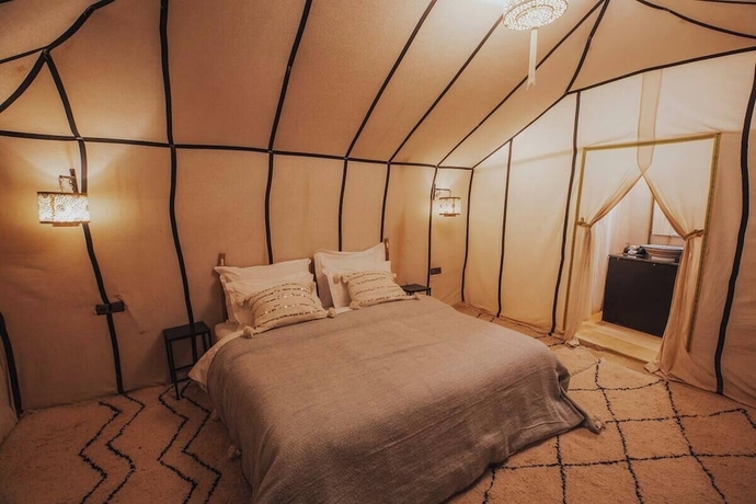 Imagen de la habitación del Hotel Merzouga Tented Camp. Foto 11
