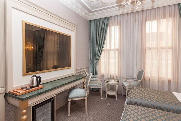 Imagen de la habitación del Hotel Meserret Palace. Foto 16