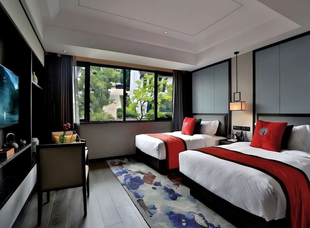 Imagen de la habitación del Hotel Meshee Sezen Suzhou. Foto 8