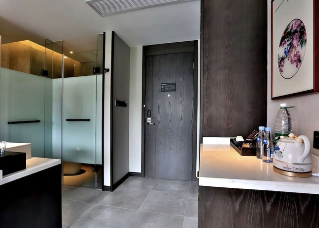 Imagen de la habitación del Hotel Meshee Sezen Suzhou. Foto 11