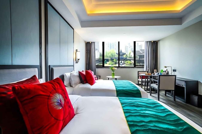 Imagen de la habitación del Hotel Meshee Sezen Suzhou. Foto 13