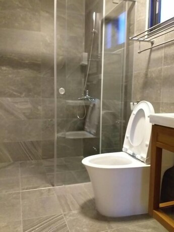 Imagen de la habitación del Hotel Mesin Inn. Foto 25