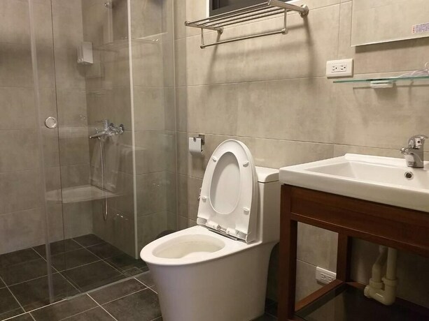 Imagen de la habitación del Hotel Mesin Inn. Foto 31