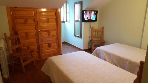 Imagen de la habitación del Hotel Mesón De L'ainsa. Foto 10