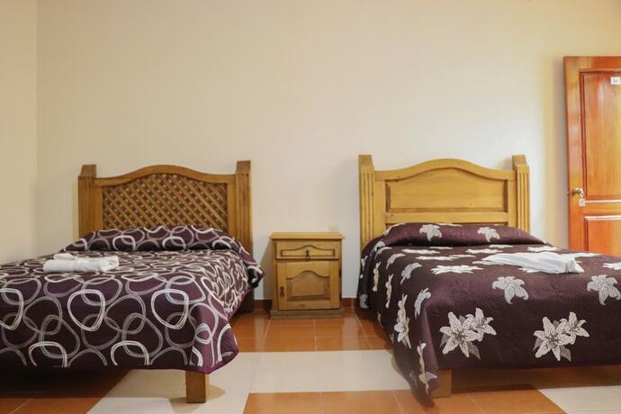 Imagen de la habitación del Hotel Mes&oacute;n de los &Aacute;ngeles. Foto 15