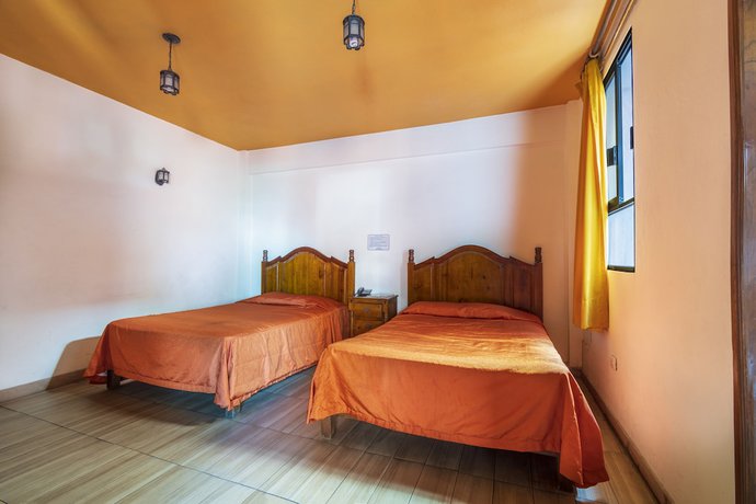 Imagen de la habitación del Hotel Meson Real and Suites. Foto 13