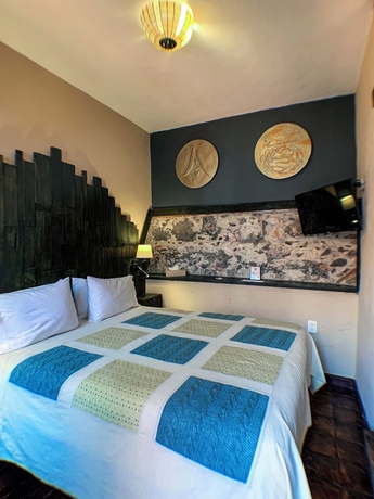 Imagen de la habitación del Hotel Mesones 49. Foto 6