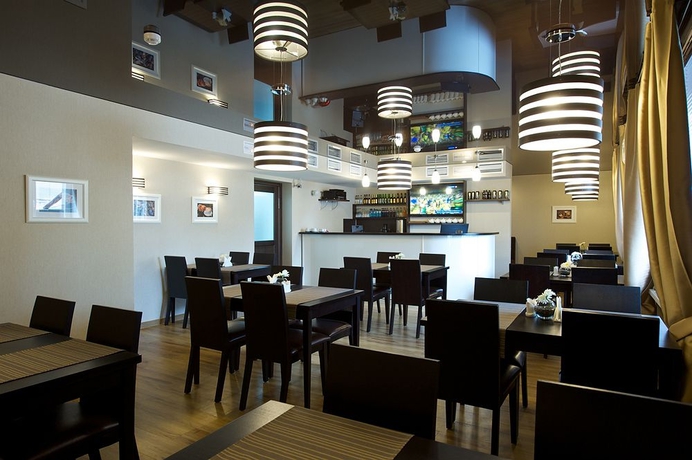Imagen del bar/restaurante del Hotel Metelitsa, NOVOSIBIRSK. Foto 3