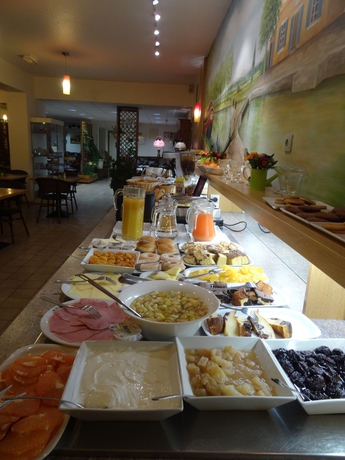 Imagen del bar/restaurante del Hotel Metrhotel Basso Cambo. Foto 6